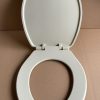 Champagne_toilet_seat_and_lid